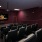 dimly-lit movie theater for residents